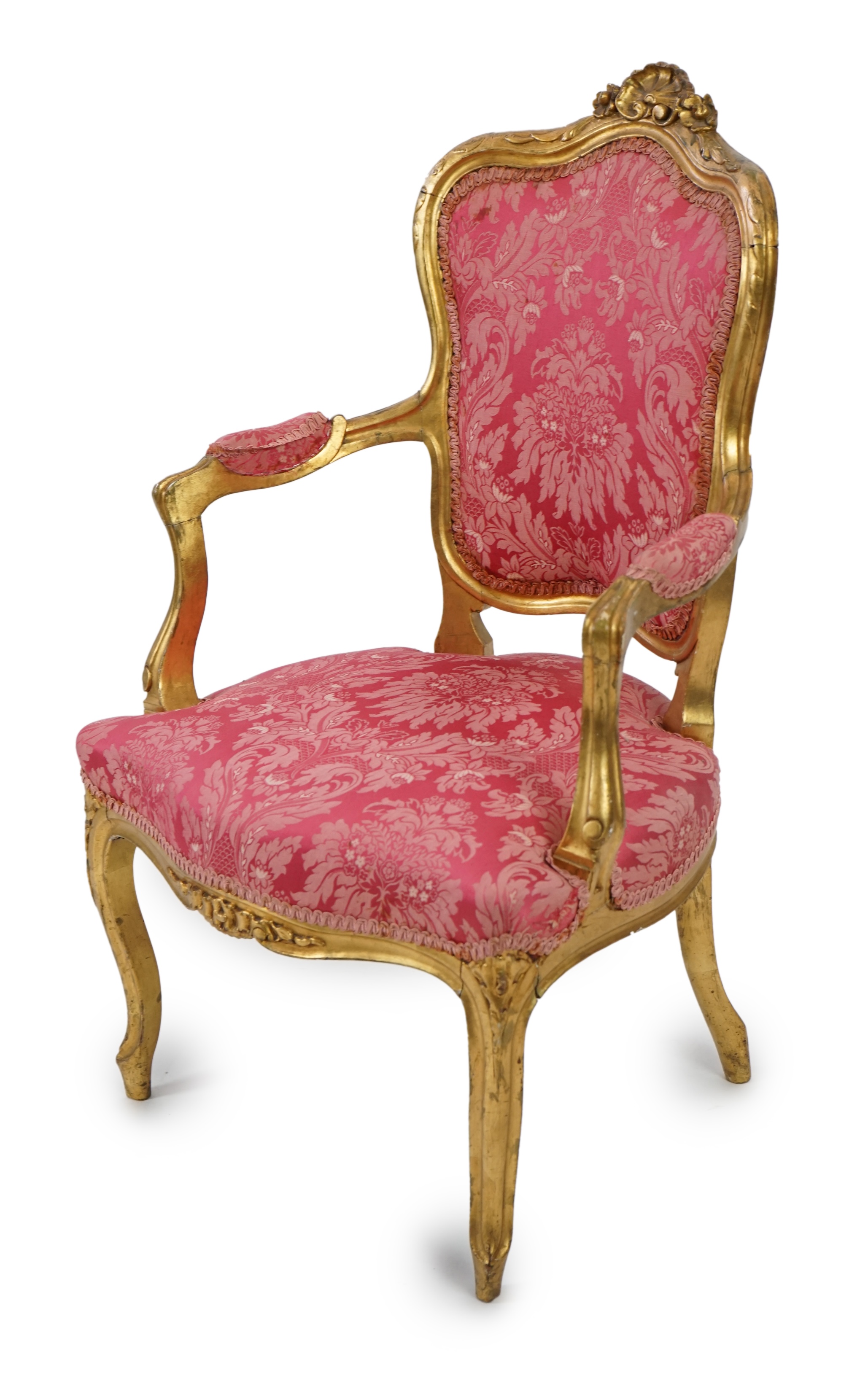 A Louis XV style carved giltwood fauteuil